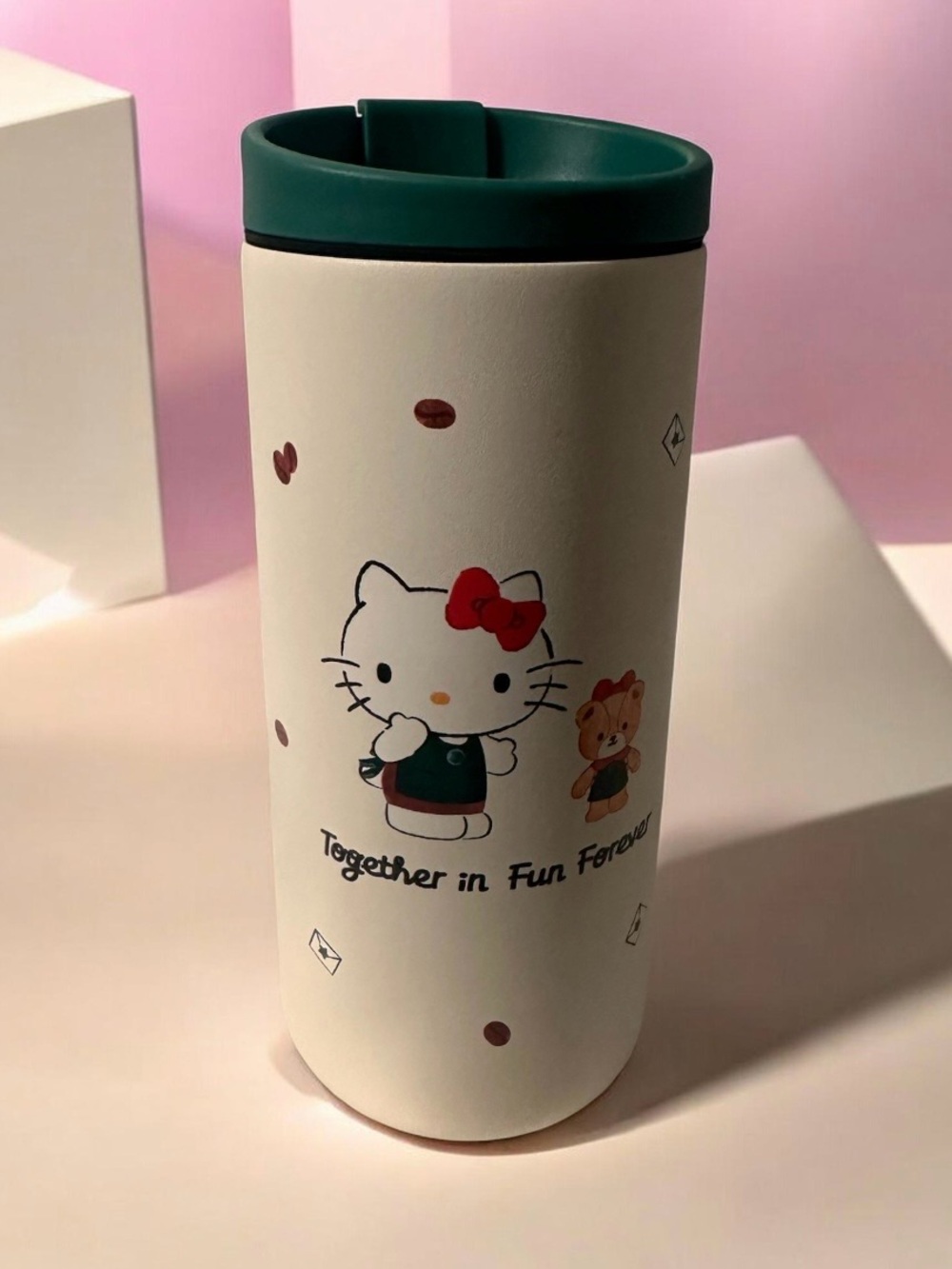 Starbucks Cream Tumbler with Dark Green Lid and Red Accent